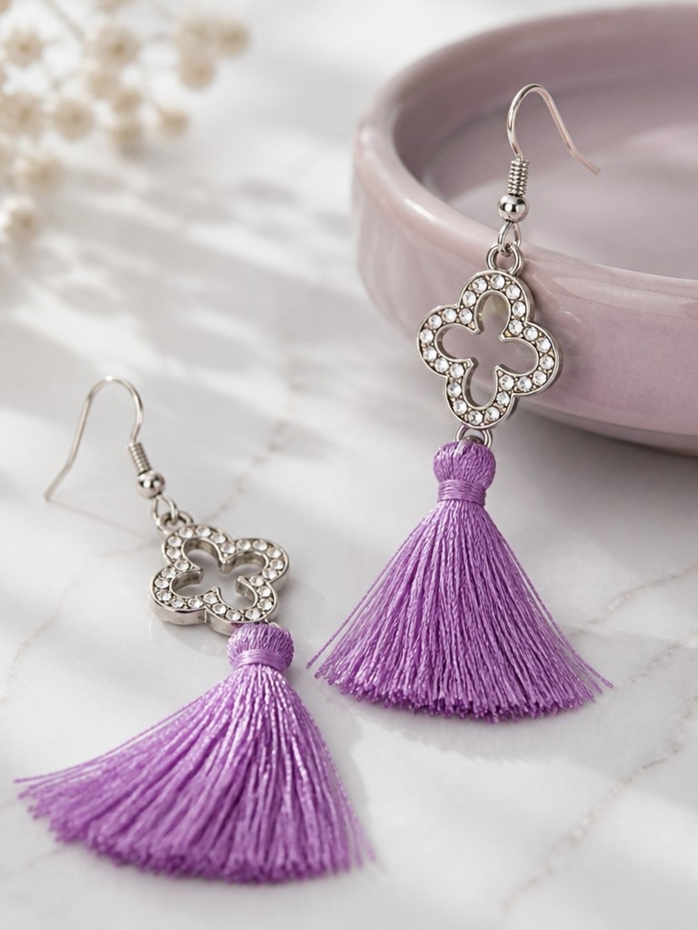 Boutique purple tassel earrings handmade with crystal-studded clover